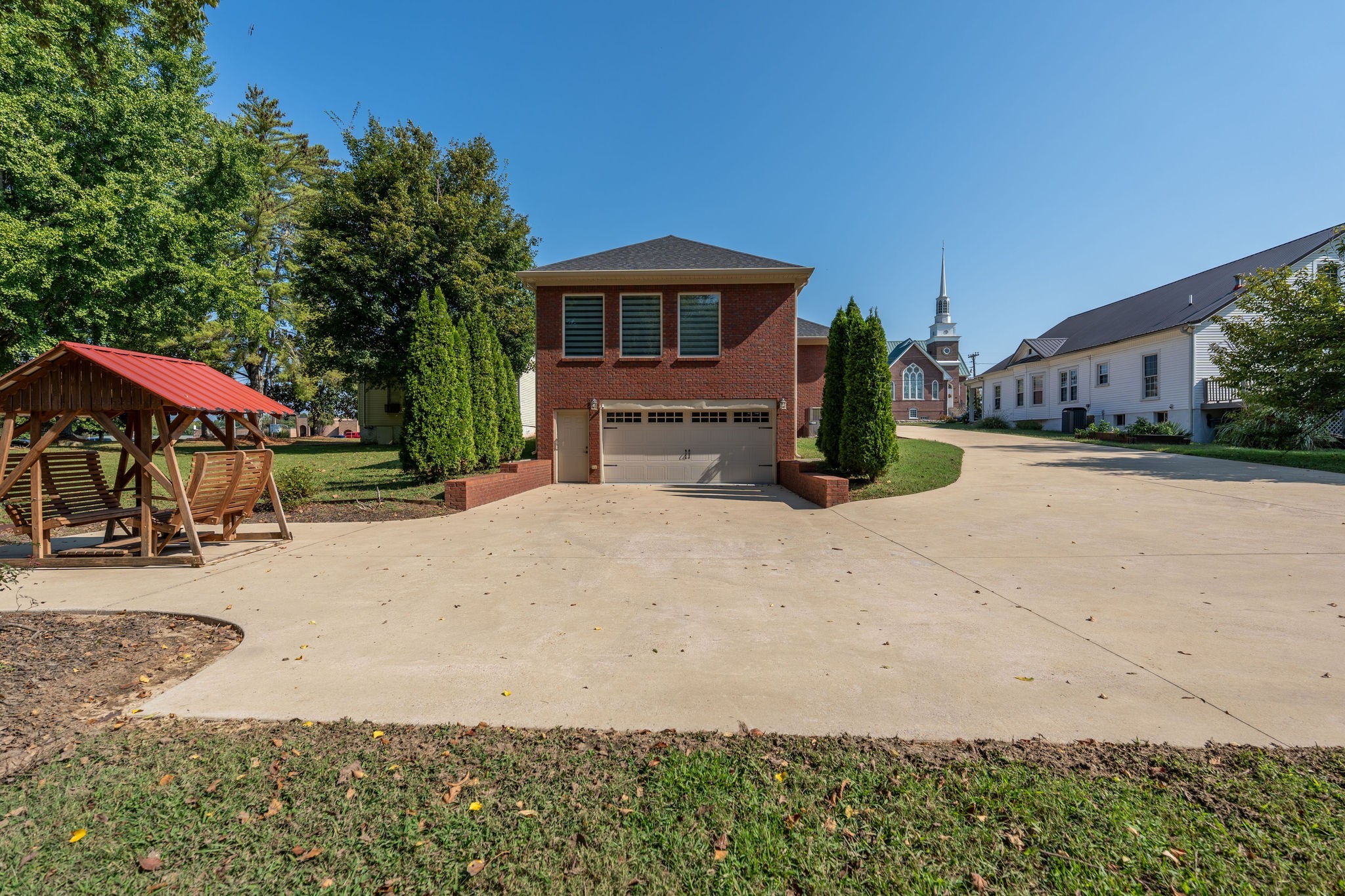 219 Waterloo Street Lawrenceburg, TN 38464 - Photo 28 of 39 a front view of a house with yard and hallway
