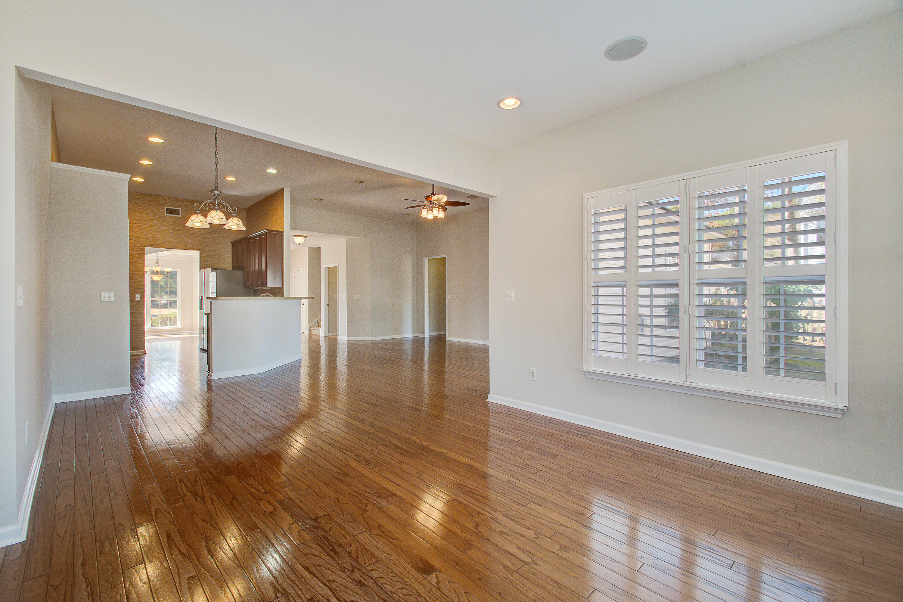 7559 Hawks Circle Hanahan, SC 29410 - Photo 9 of 33 Sun Room Looking to Family/Kitchen