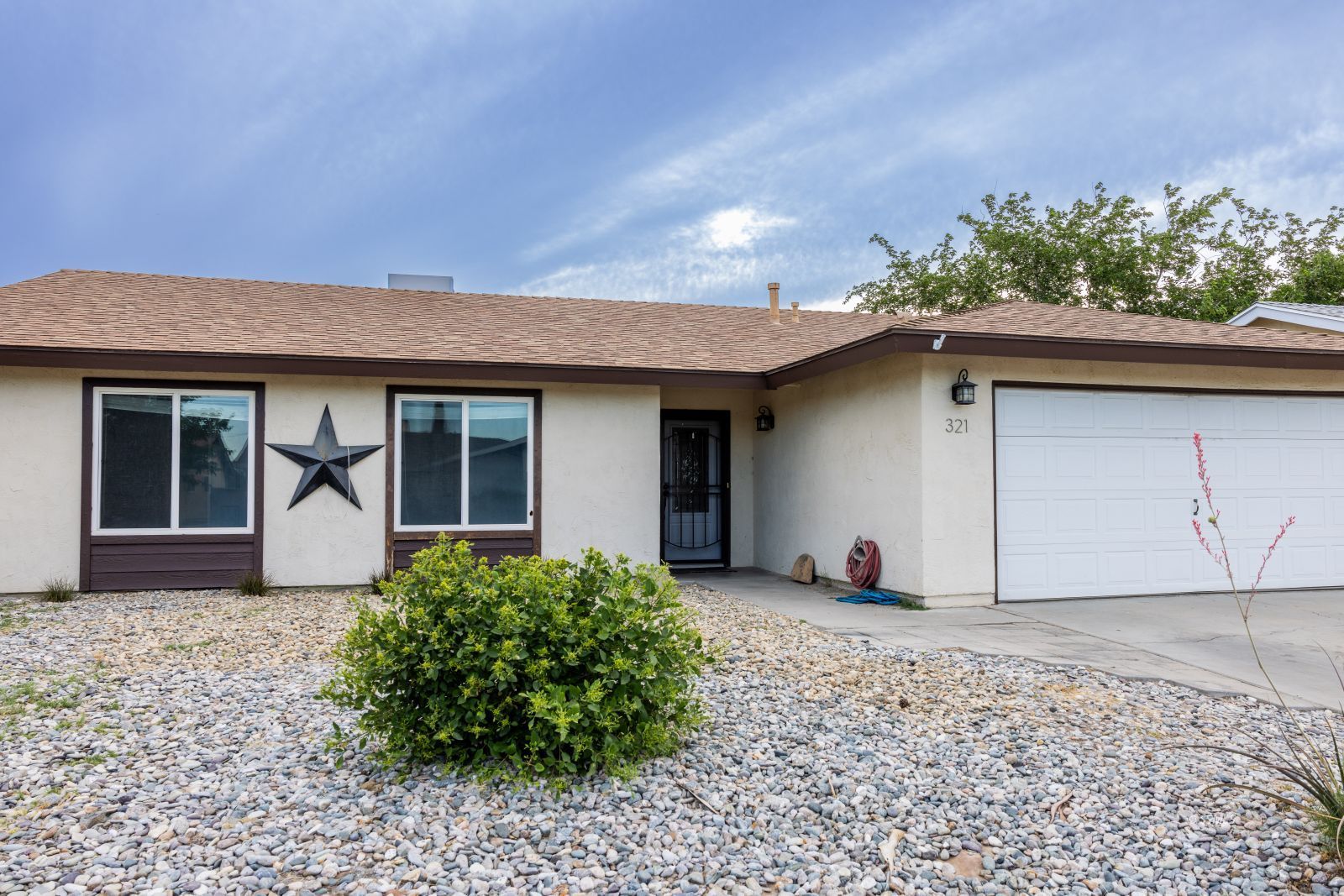 321 Mari Court Ridgecrest, CA 93555 - Photo 3 of 26 front view of a house with a yard