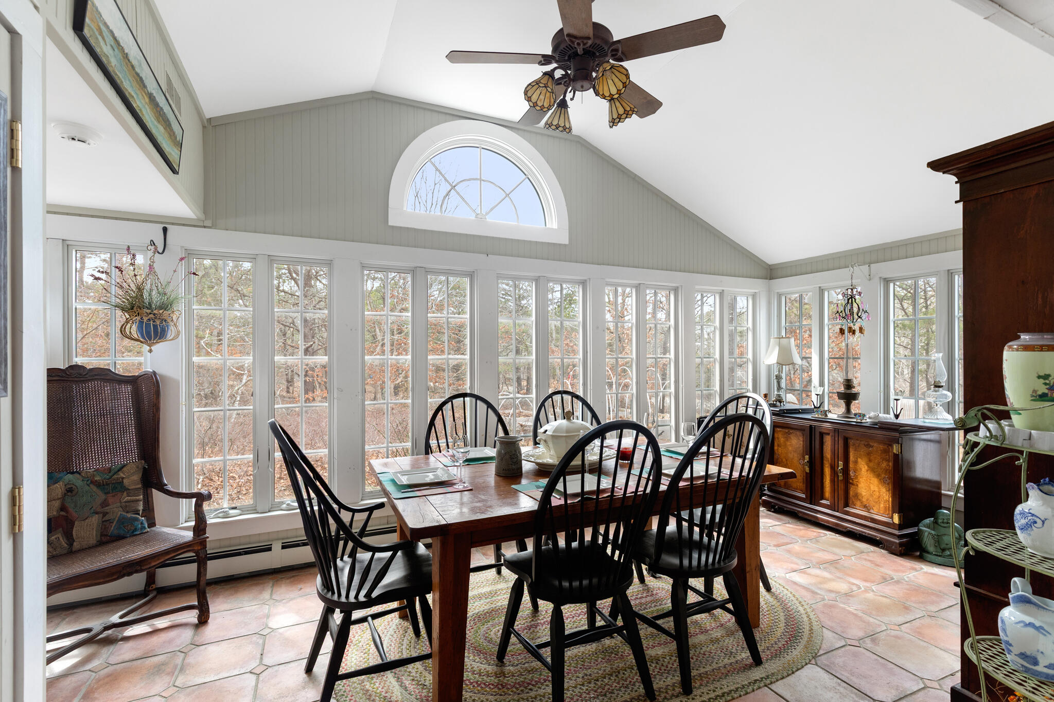 311 South Sunken Meadow Road Eastham, MA 02642 - Photo 19 of 57 a view of a dining room and livingroom with furniture window and wooden floor