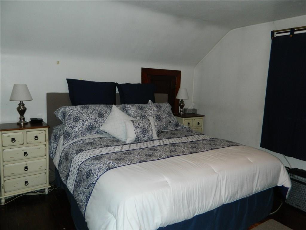 1050 Winfield Road Cabot, PA 16023 - Photo 12 of 23 MASTER BEDROOM WITH EXPOSED HARDWOOD FLOORS