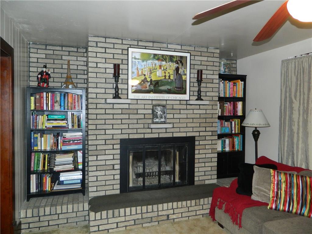 1050 Winfield Road Cabot, PA 16023 - Photo 4 of 23 AND THEN YOUR EYE CATCHES THE FIREPLACE! AWESOME FOR SURE!