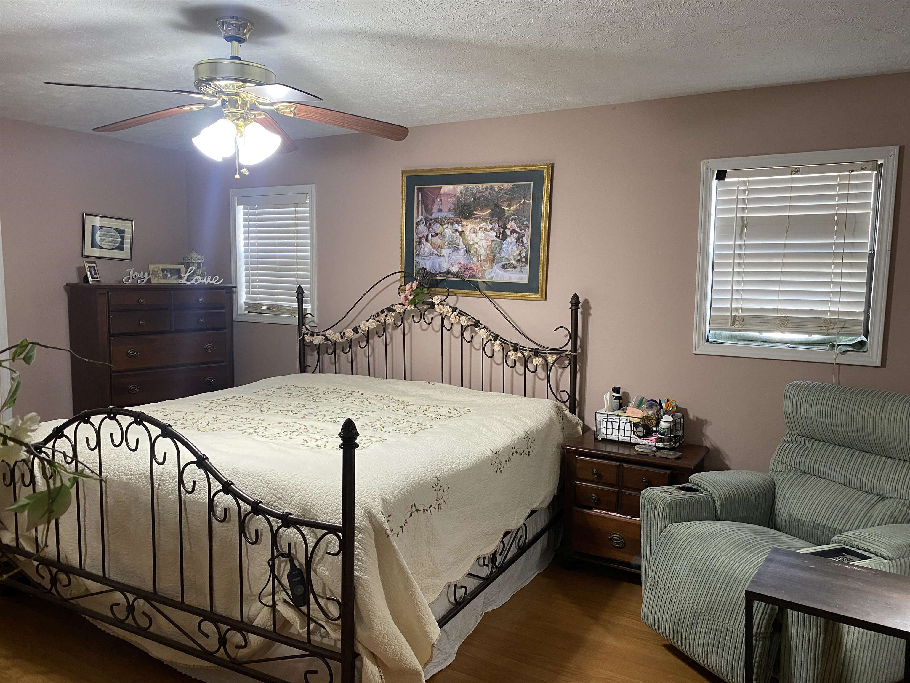 2835 Cerro Gordo Road Olivehill, TN 38475 - Photo 23 of 40 a bed room with a bed and a chandelier