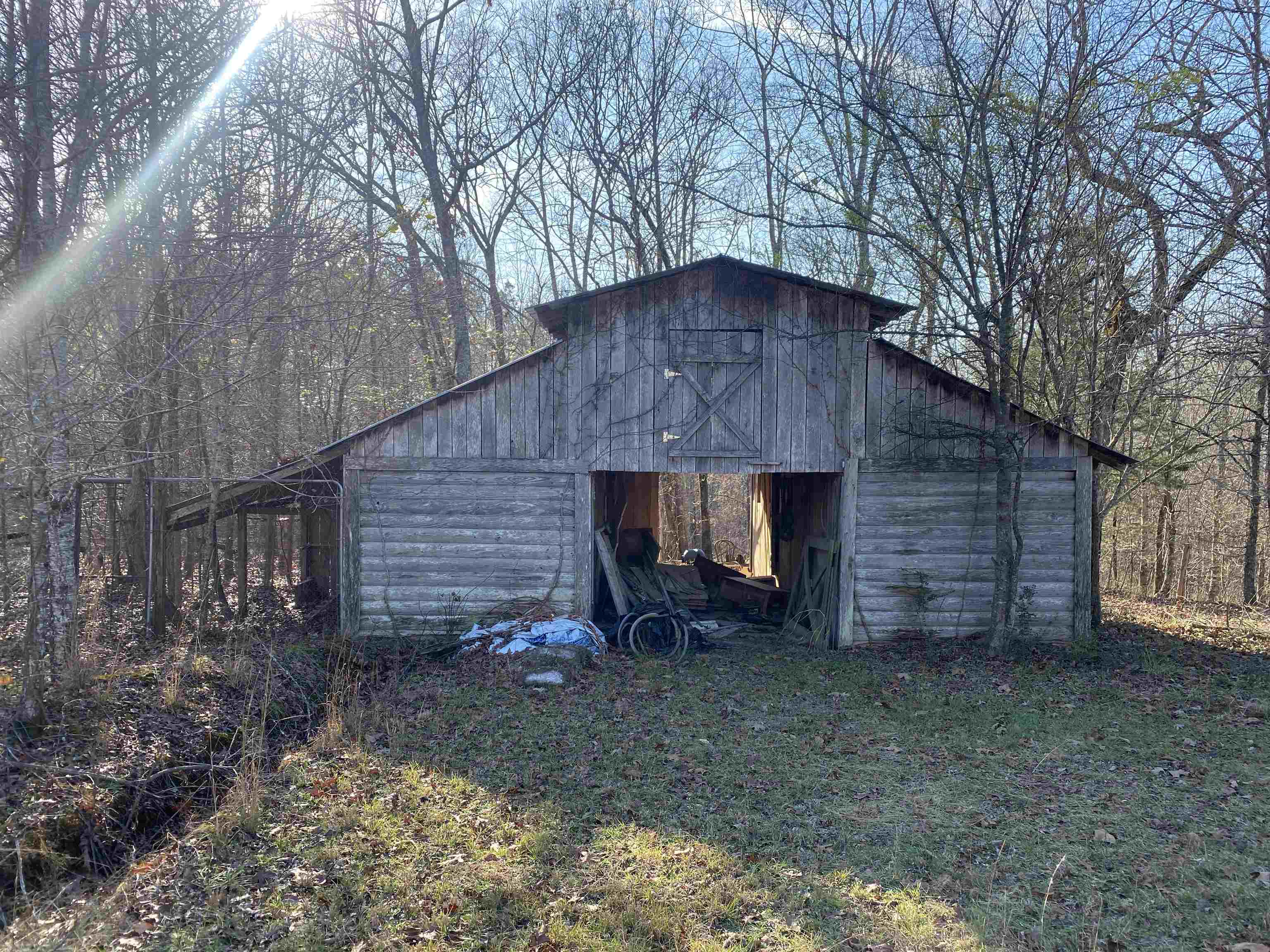 2835 Cerro Gordo Road Olivehill, TN 38475 - Photo 34 of 40 a backyard of a house with barbeque oven and yard