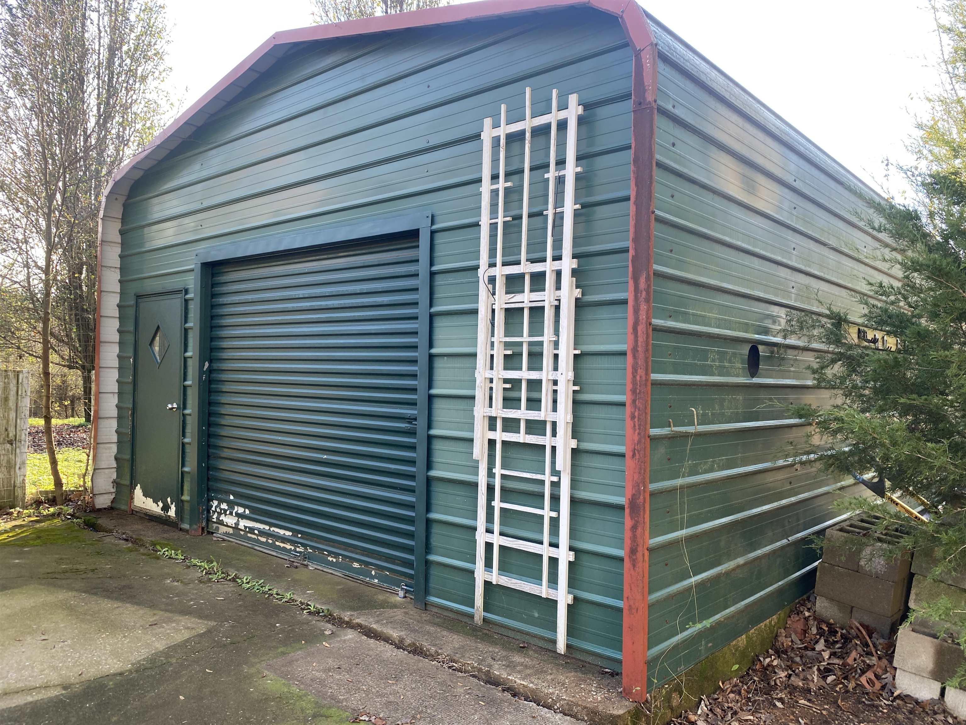 2835 Cerro Gordo Road Olivehill, TN 38475 - Photo 39 of 40 a front view of a house with a garage