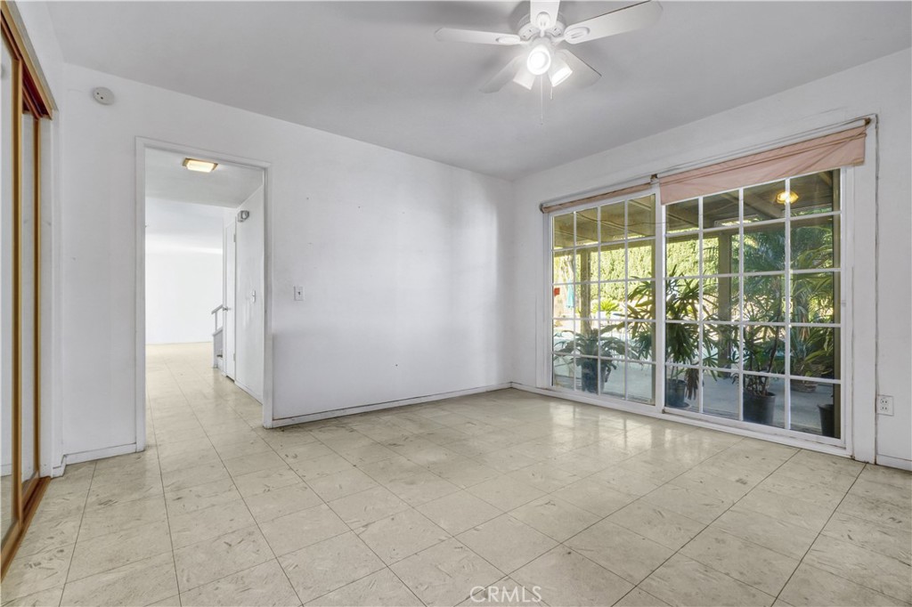 23141 Tulip Street Lake Forest, CA 92630 - Photo 13 of 27 a view of an empty room with a window