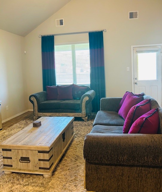 7723 London Tower Lane Houston, TX 77044 - Photo 6 of 11 a living room with furniture and a window