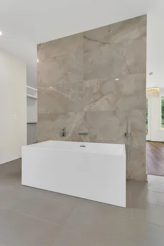 a bathroom with a bathtub