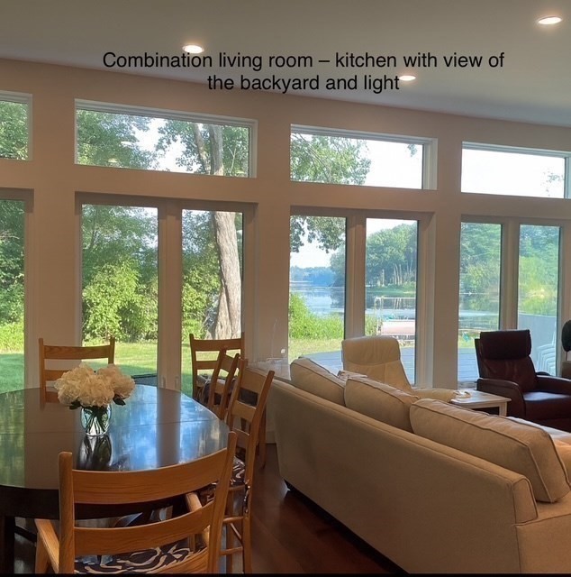 25 Sturges Road, Unit 2 Sharon, MA 02067 - Photo 11 of 28 a living room with furniture and a floor to ceiling window