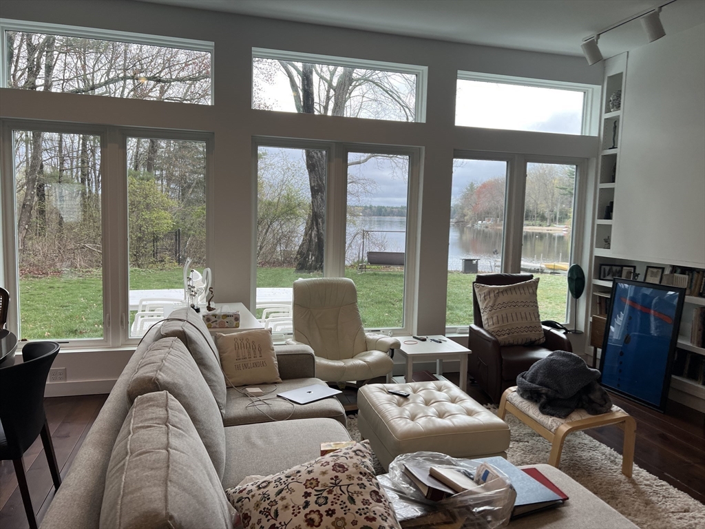 25 Sturges Road, Unit 2 Sharon, MA 02067 - Photo 14 of 28 a living room with furniture and floor to ceiling windows