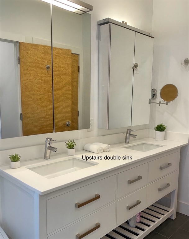 25 Sturges Road, Unit 2 Sharon, MA 02067 - Photo 25 of 28 a bathroom with a granite countertop sink and a mirror
