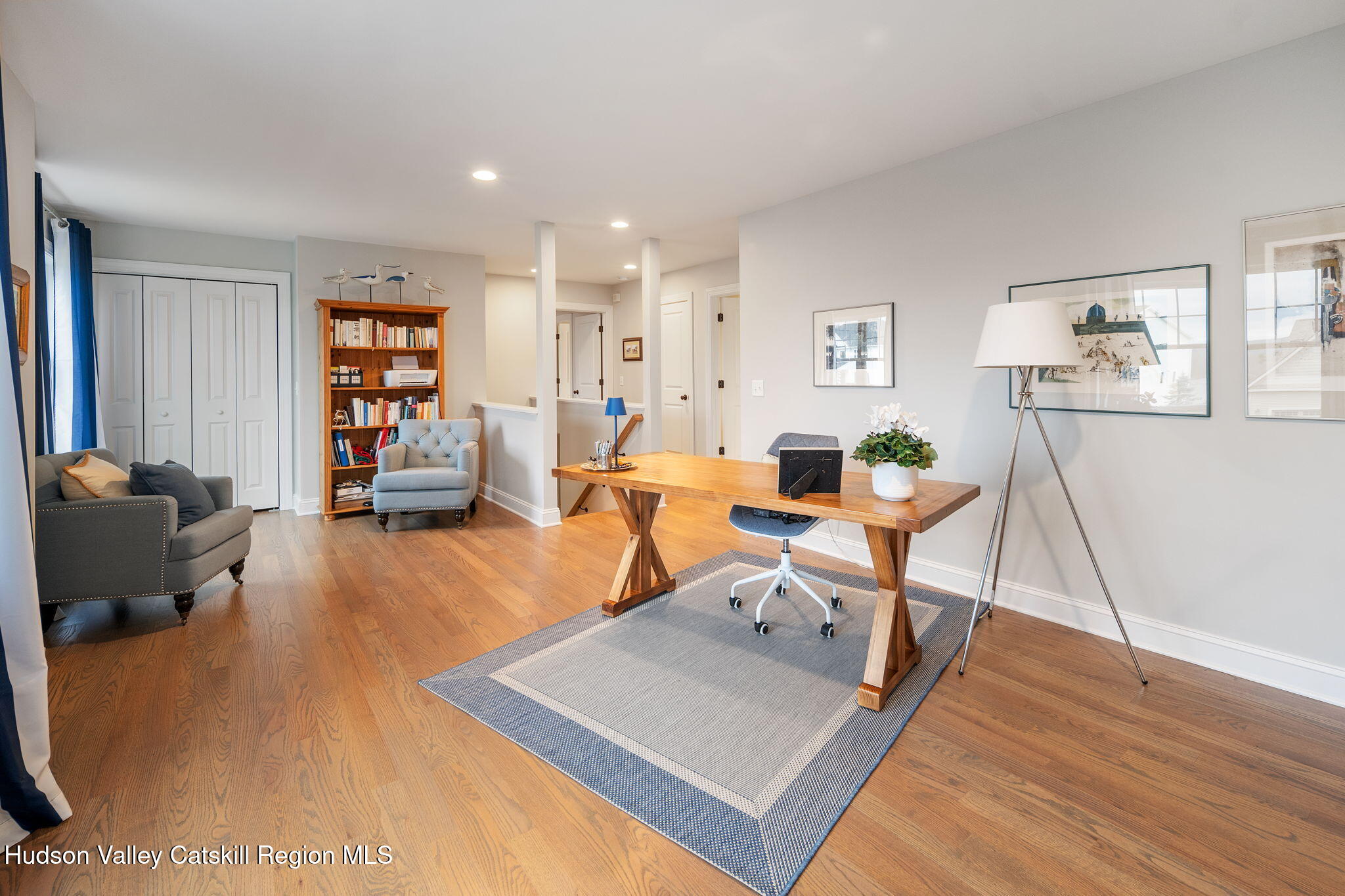 22 Edinburgh Court New Scotland, NY 12159 - Photo 22 of 48 a living room with furniture a rug and a large window