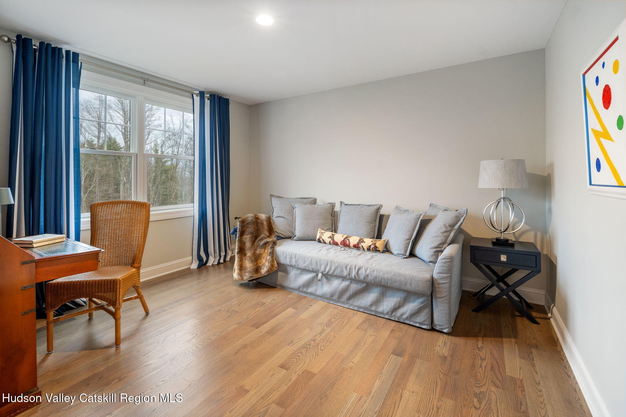 22 Edinburgh Court New Scotland, NY 12159 - Photo 30 of 48 a living room with furniture and a wooden floor