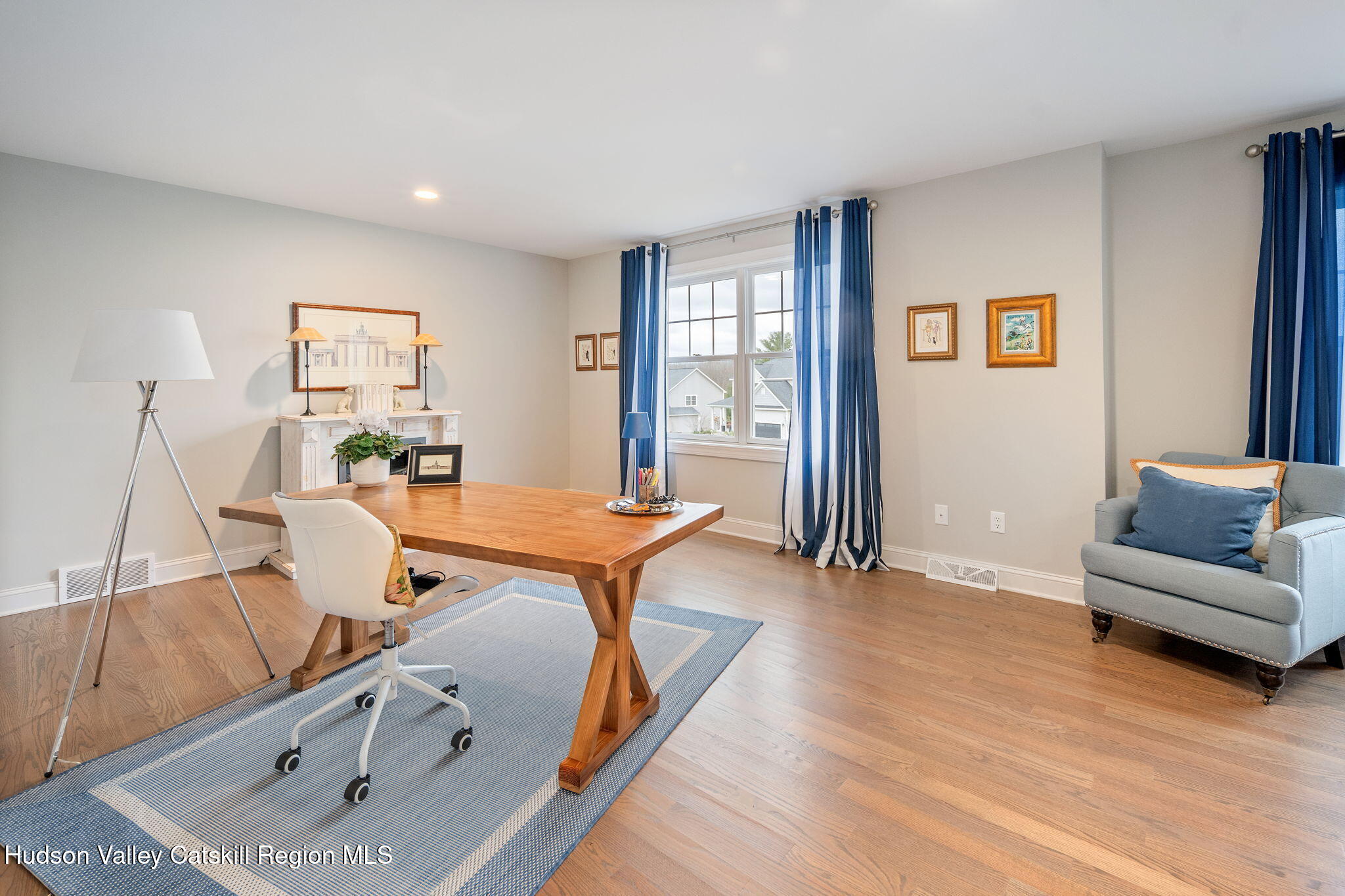 22 Edinburgh Court New Scotland, NY 12159 - Photo 7 of 48 a room with furniture and a wooden floor