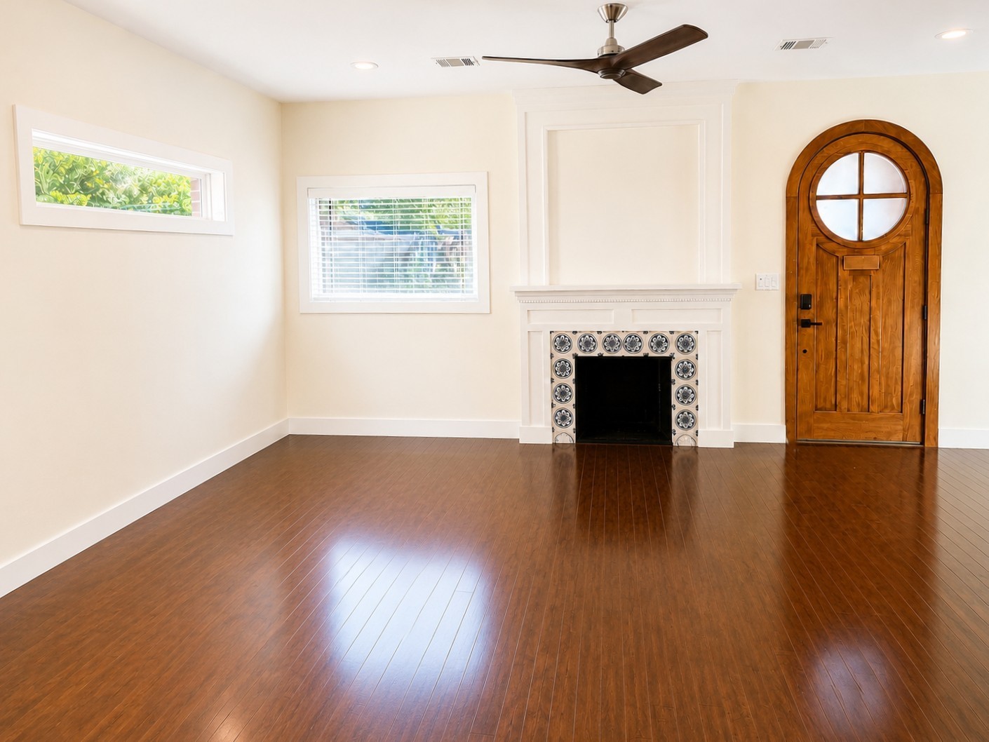 2302 Ruth Street Houston, TX 77004 - Photo 2 of 18 An arched door opens into the living room.
