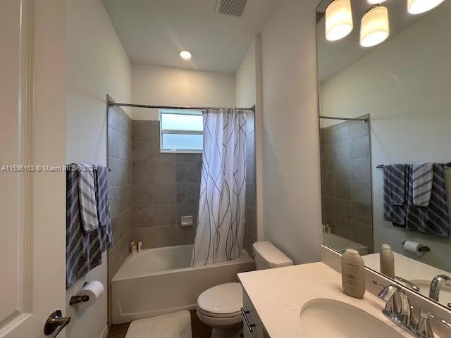 5545 Hampton Links Court, Unit 5545 Ave Maria, FL 34142 - Photo 13 of 28 a bathroom with a sink toilet and shower