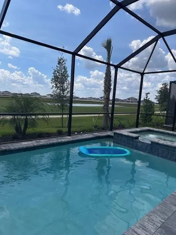 a swimming pool with outdoor space