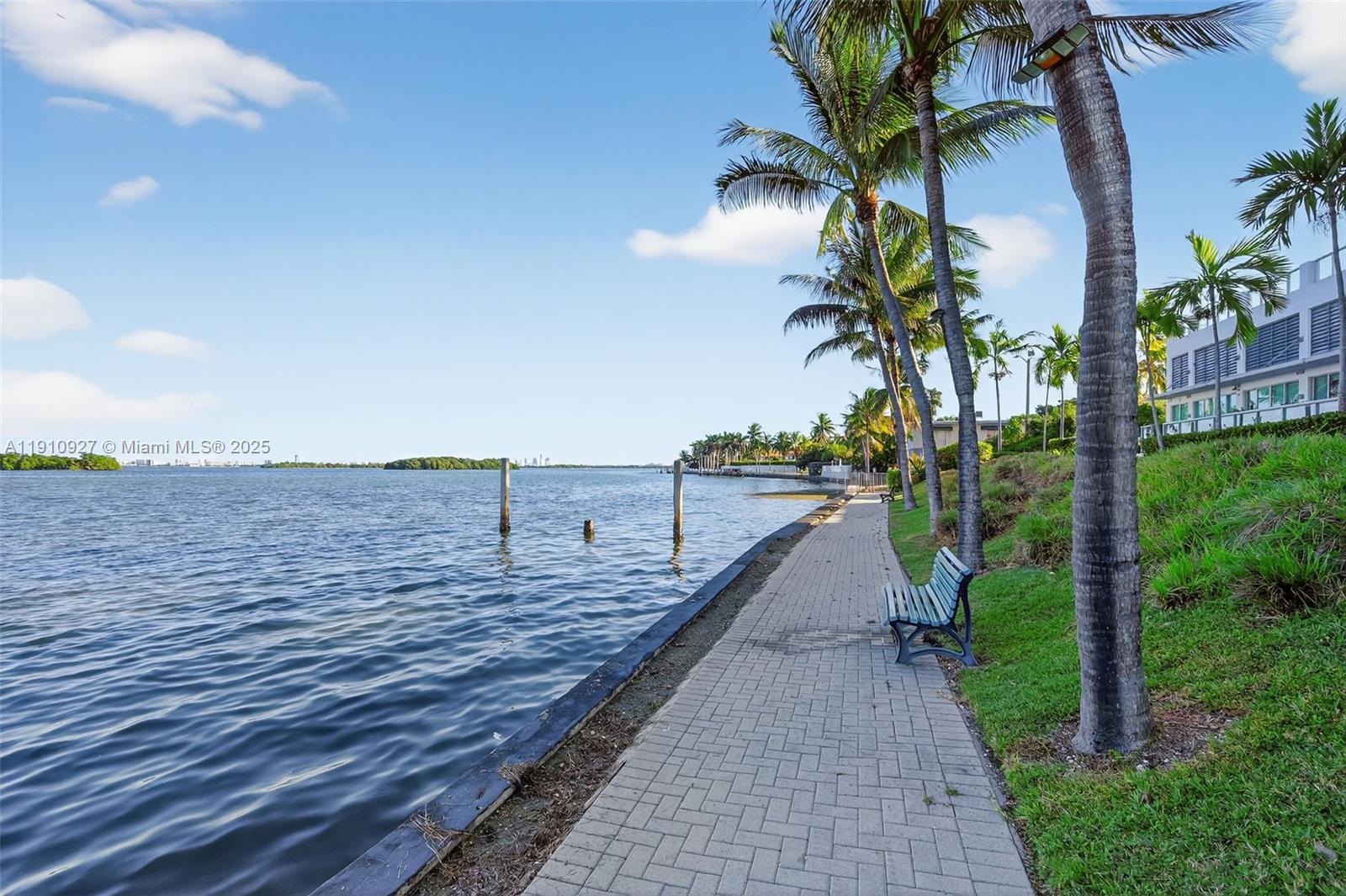 720 Northeast 62nd Street, Unit 311 Miami, FL 33138 - Photo 37 of 39 a view of a terrace with a garden