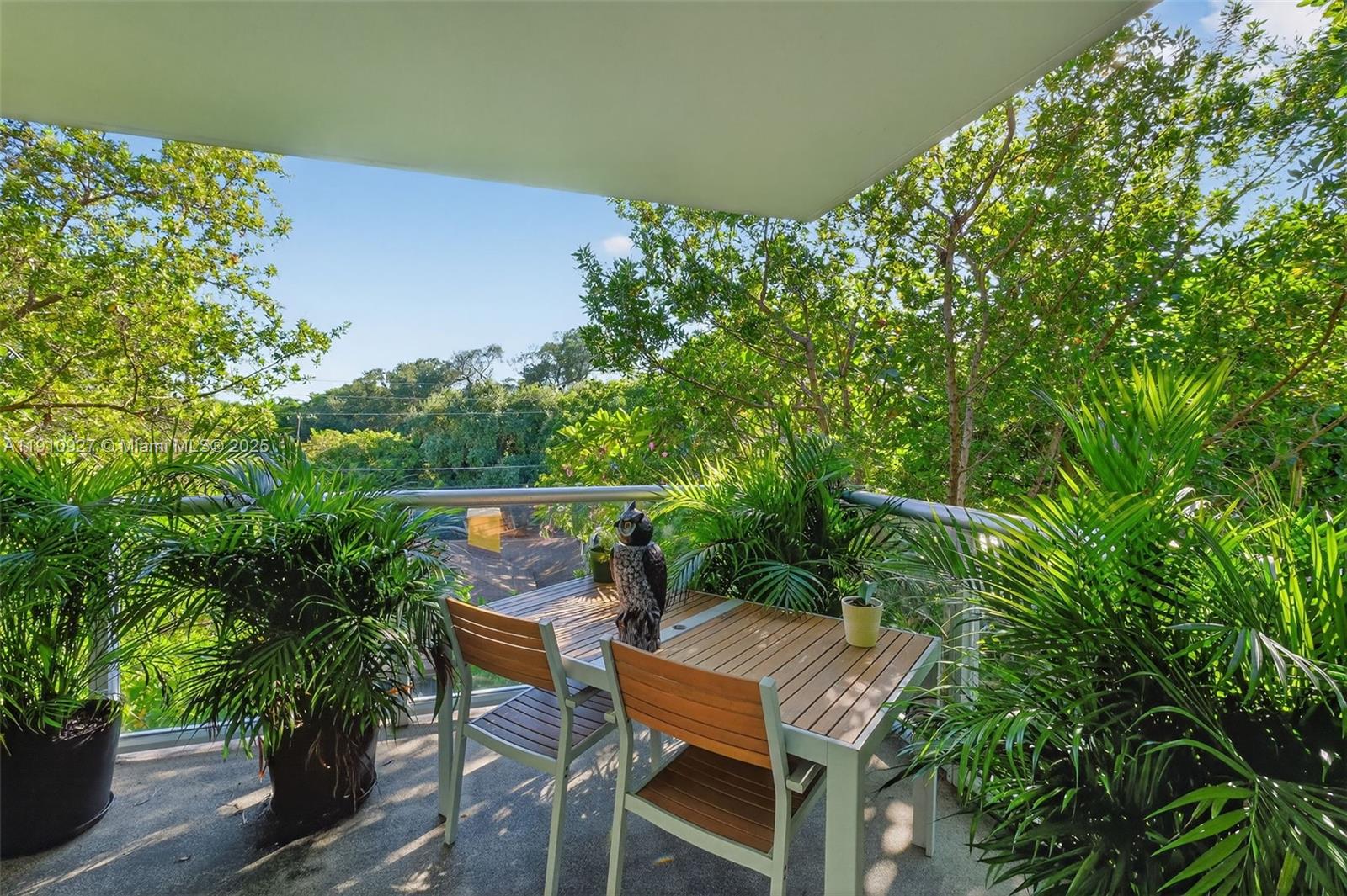 720 Northeast 62nd Street, Unit 311 Miami, FL 33138 - Photo 4 of 39 an outdoor space with furniture