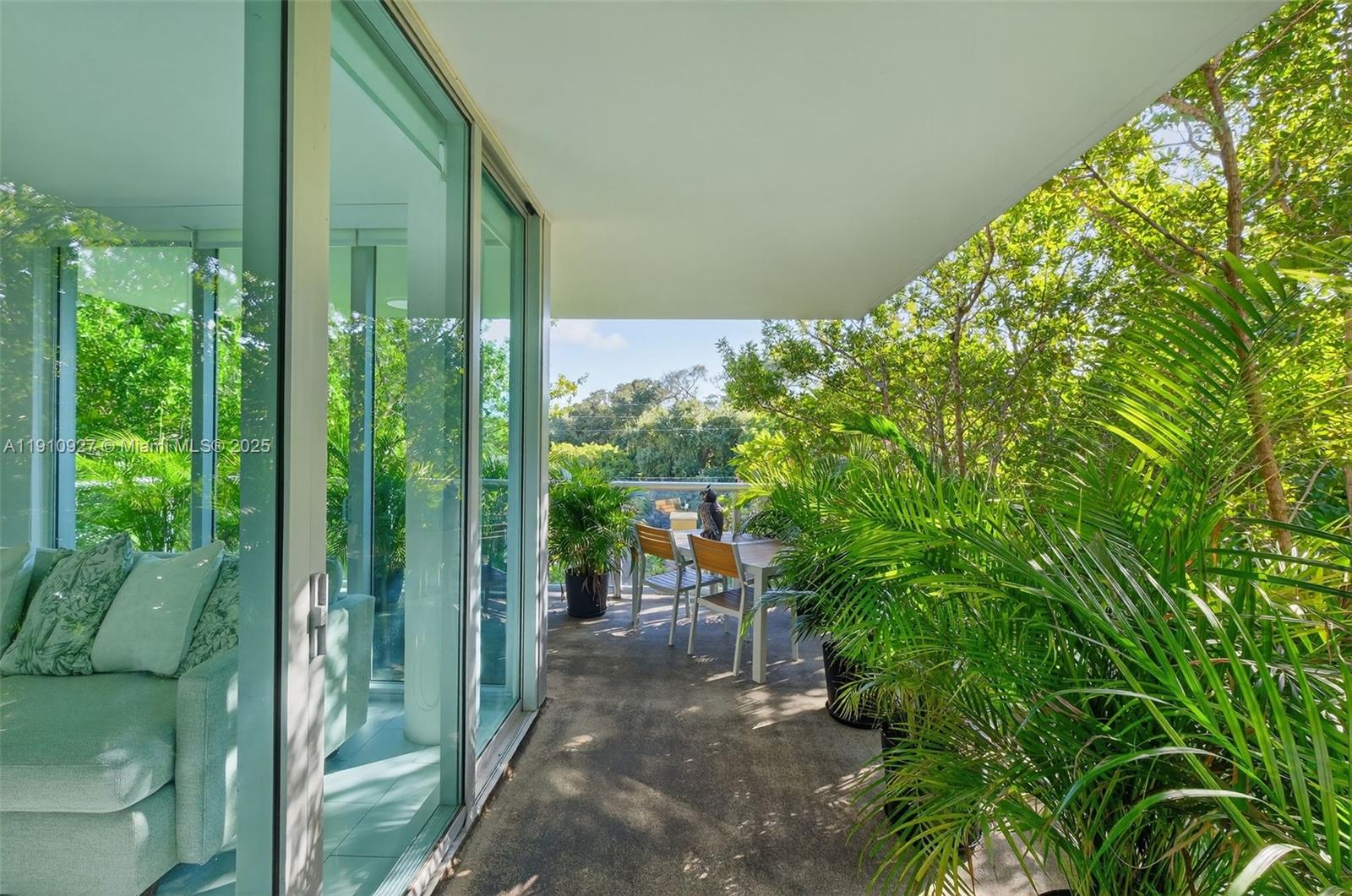 720 Northeast 62nd Street, Unit 311 Miami, FL 33138 - Photo 5 of 39 a view of a garden