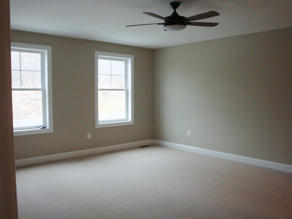 6 Keyes Hill Road Hollis, NH 03049 - Photo 10 of 13 an empty room with a window