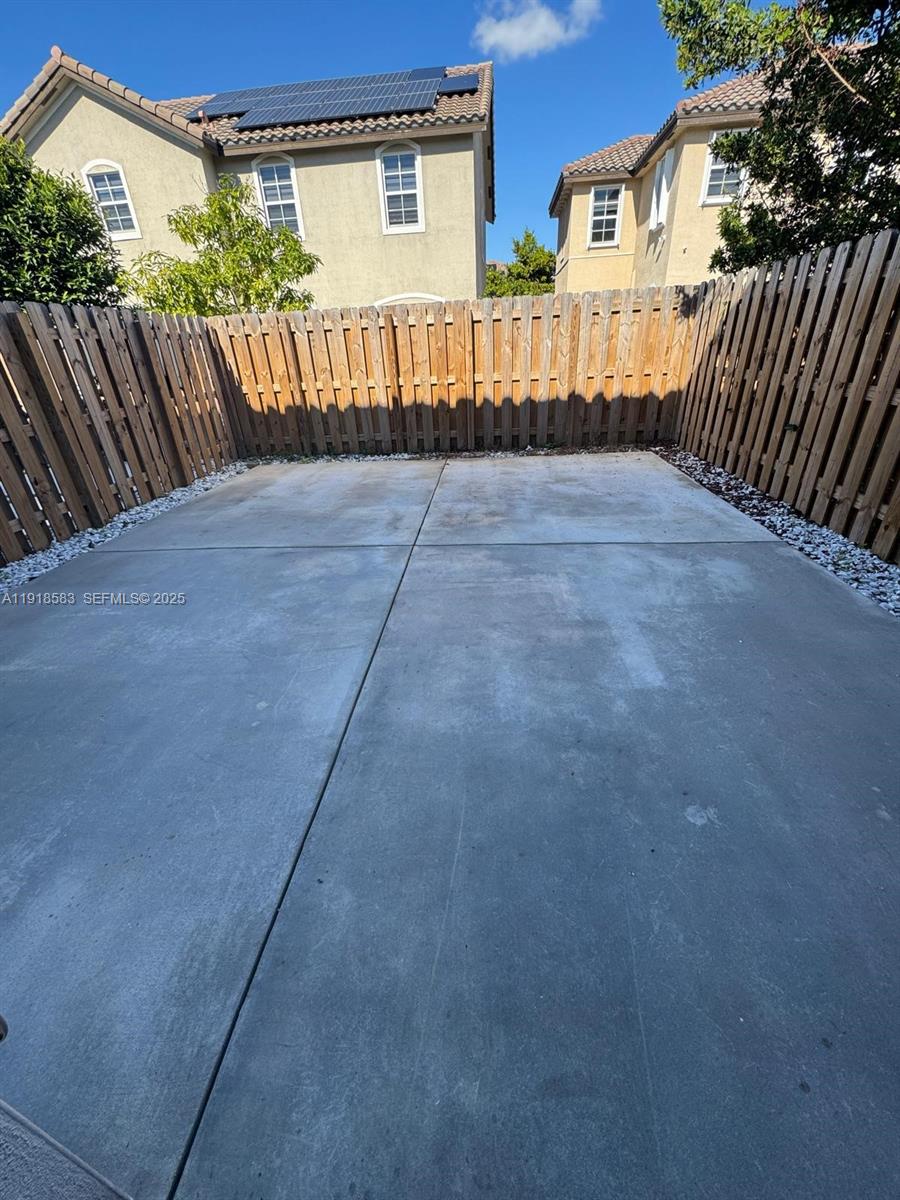 11745 Southwest 245 Terrace Homestead, FL 33032 - Photo 14 of 15 a view of backyard with a garden and deck
