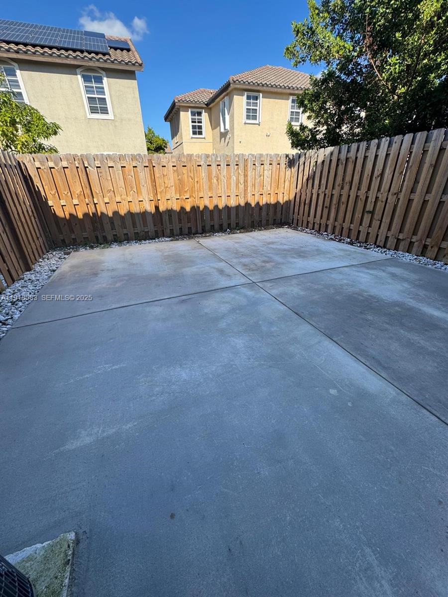 11745 Southwest 245 Terrace Homestead, FL 33032 - Photo 15 of 15 a view of a house with a fence