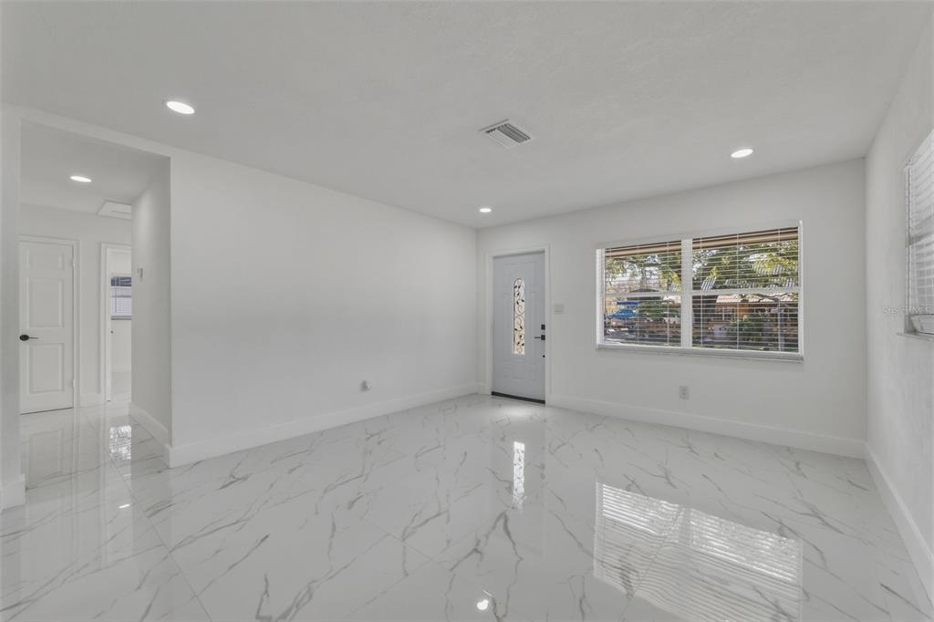 1413 May Street Lutz, FL 33548 - Photo 13 of 43 an empty room with windows