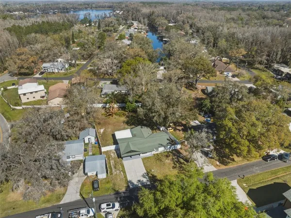an aerial view of residential house with outdoor space
