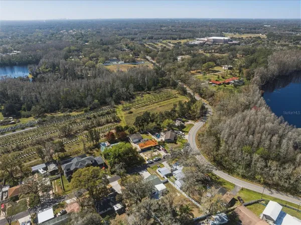 an aerial view of residential house and green space