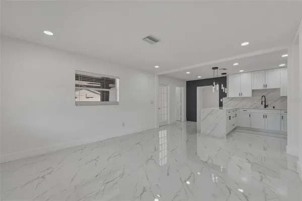 a view of a kitchen with a sink