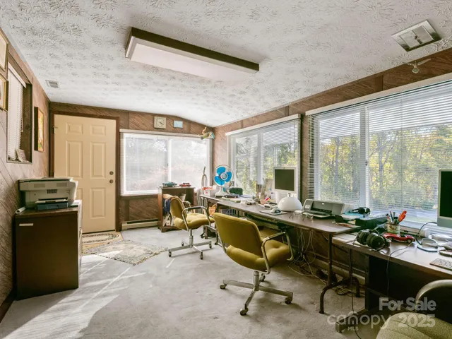a utility room with cabinets dryer and washer