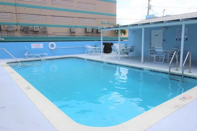 a view of a lake with a yard