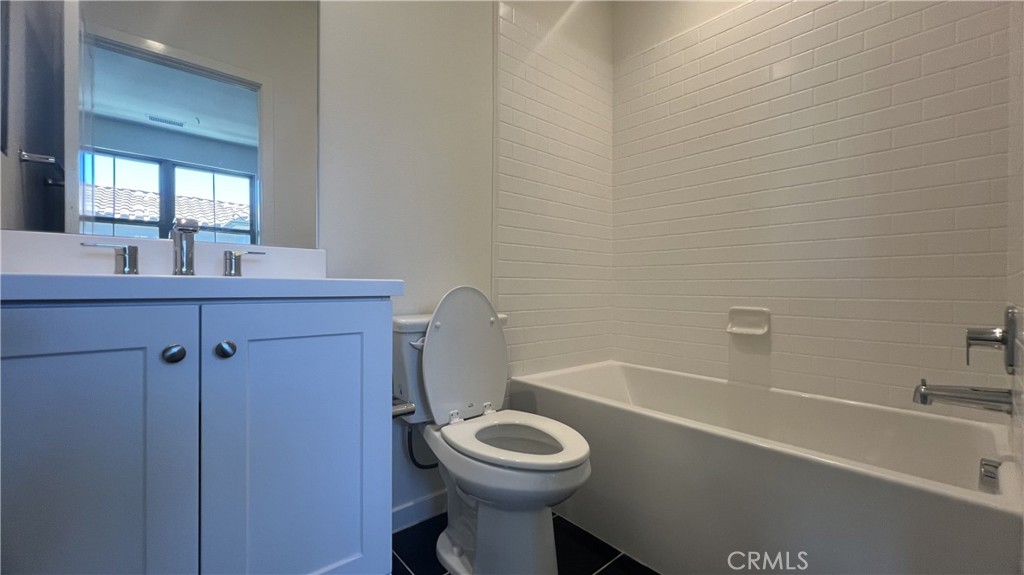 110 Sunnyside Irvine, CA 92618 - Photo 17 of 30 a bathroom with a sink a toilet and bathtub