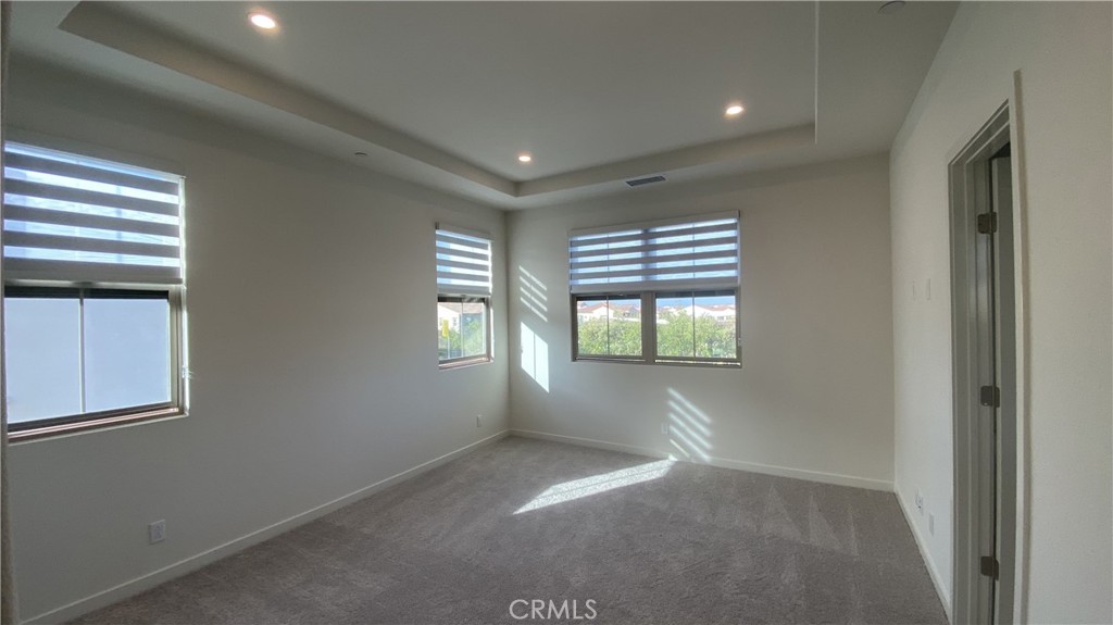 110 Sunnyside Irvine, CA 92618 - Photo 23 of 30 a view of empty room with windows