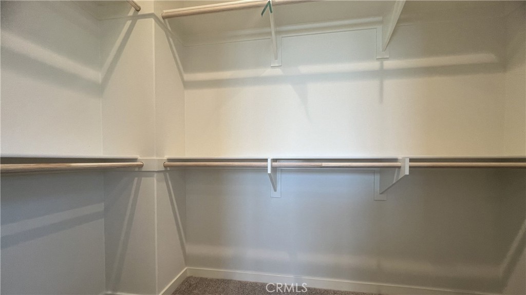 110 Sunnyside Irvine, CA 92618 - Photo 24 of 30 a view of a room with racks on the wall