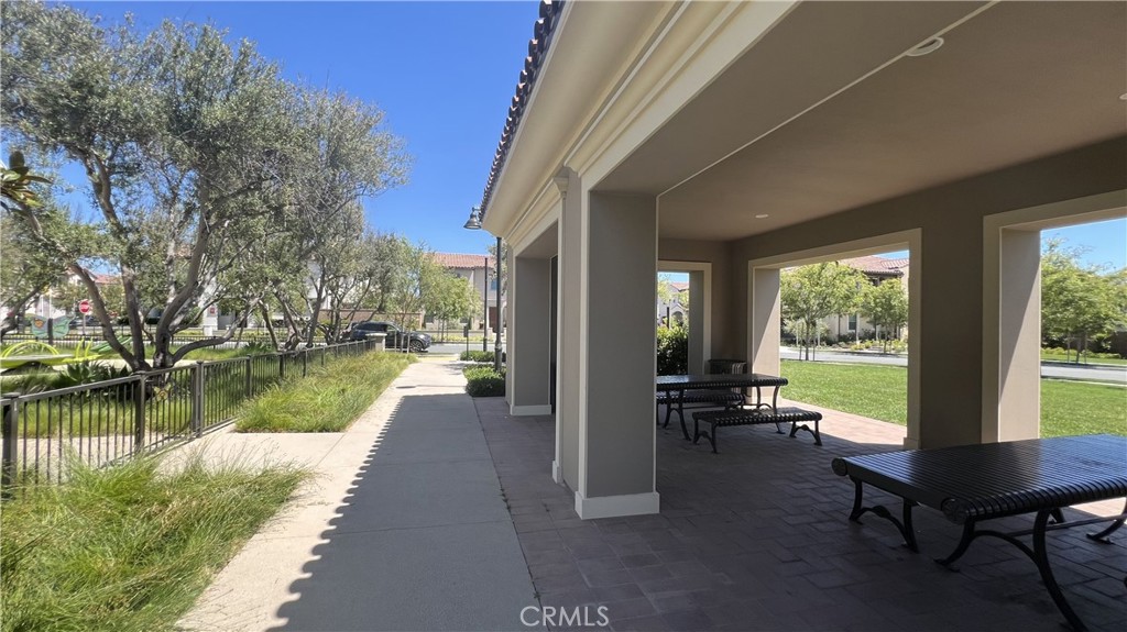 110 Sunnyside Irvine, CA 92618 - Photo 30 of 30 a view of a lake from a porch