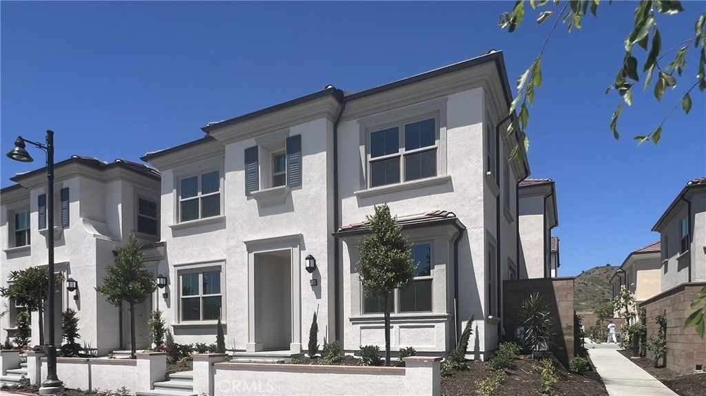 110 Sunnyside Irvine, CA 92618 - Photo 3 of 30 a front view of a building with street view