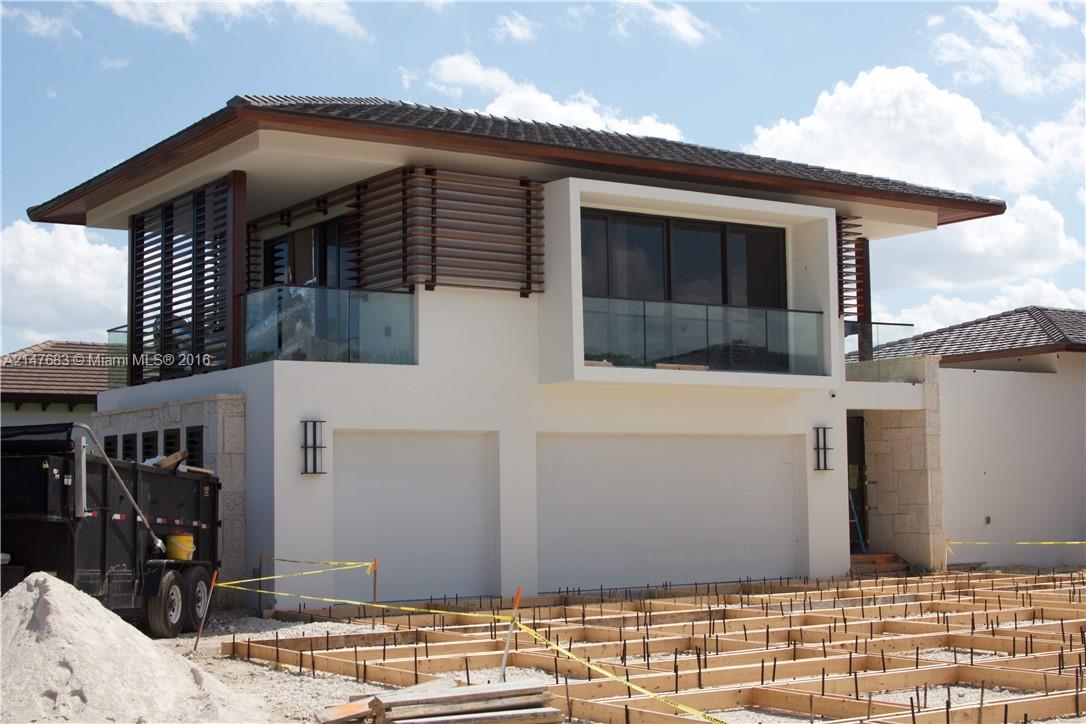 9000 Southwest 63rd Court Pinecrest, FL 33156 - Photo 15 of 26 a front view of a house