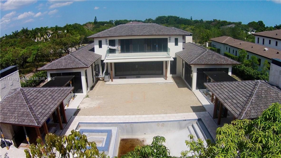 9000 Southwest 63rd Court Pinecrest, FL 33156 - Photo 18 of 26 an aerial view of a house with yard porch and furniture