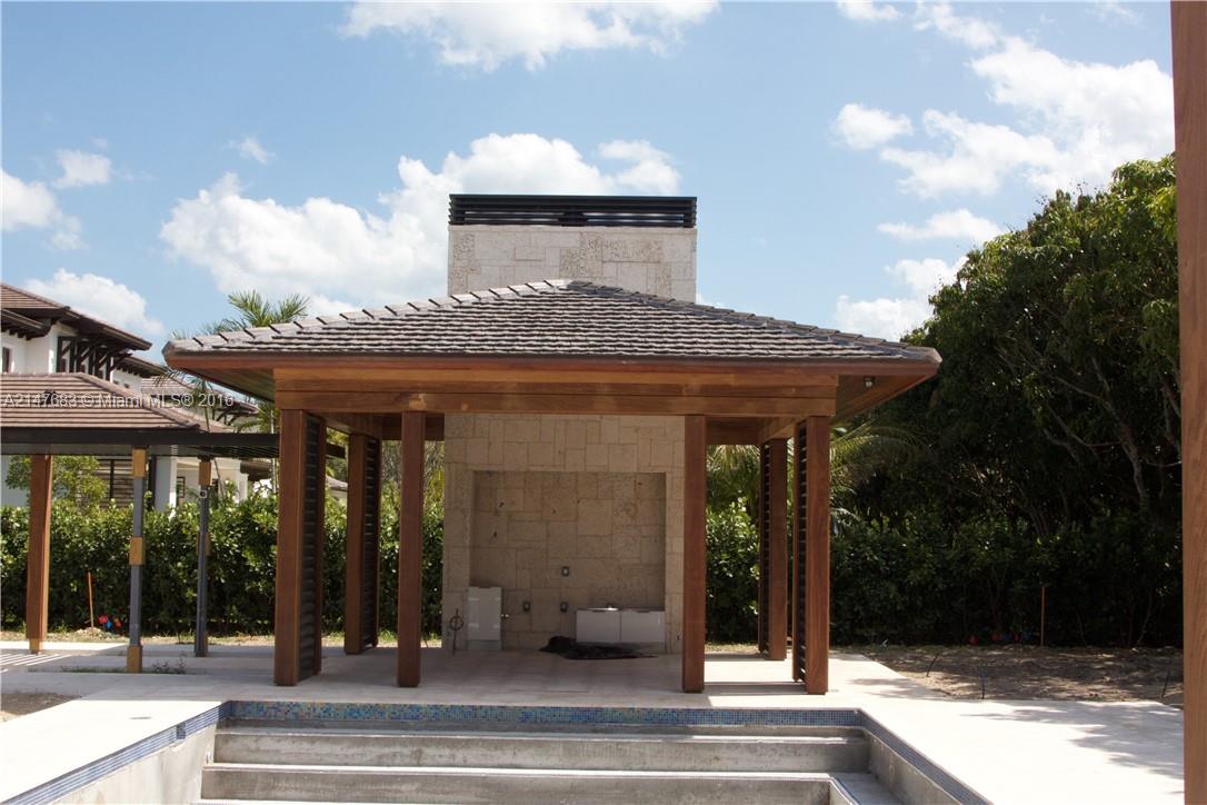 9000 Southwest 63rd Court Pinecrest, FL 33156 - Photo 22 of 26 a view of a building entrance