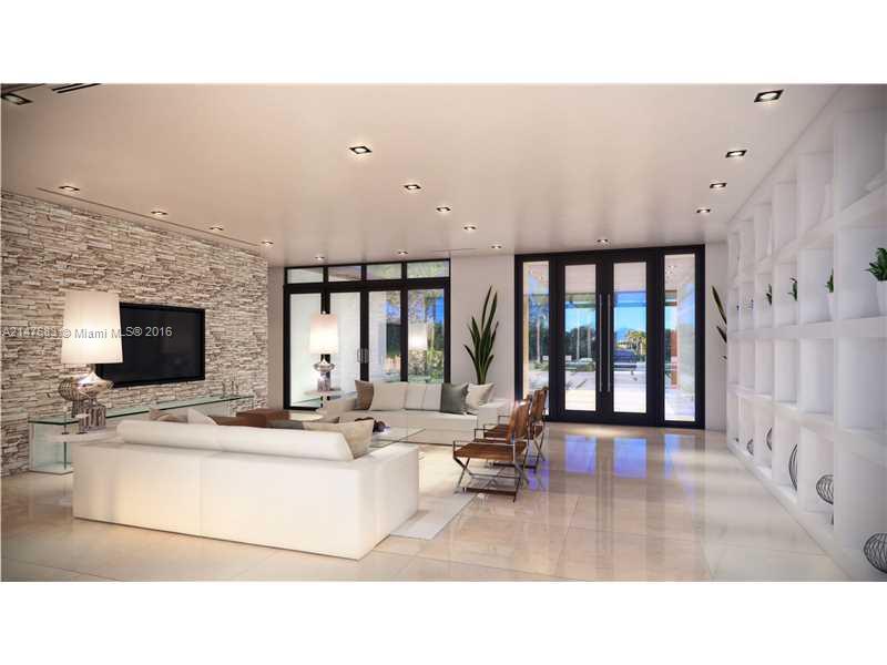 9000 Southwest 63rd Court Pinecrest, FL 33156 - Photo 4 of 26 a kitchen with a sink and a fireplace