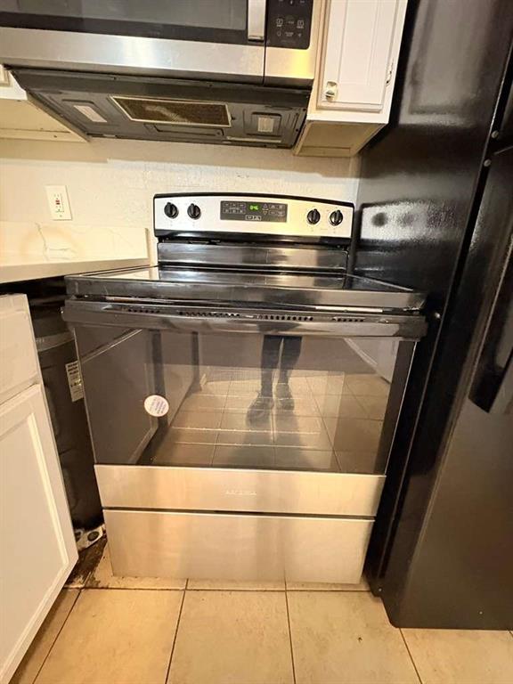 9821 Walnut Street, Unit 304 Dallas, TX 75243 - Photo 6 of 15 a close view of stove