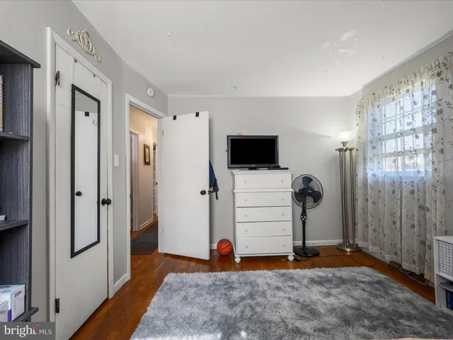 a view of room with workspace and mirror