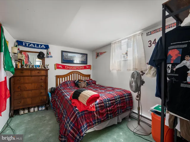 a kitchen with a white stove top oven sink and cabinets