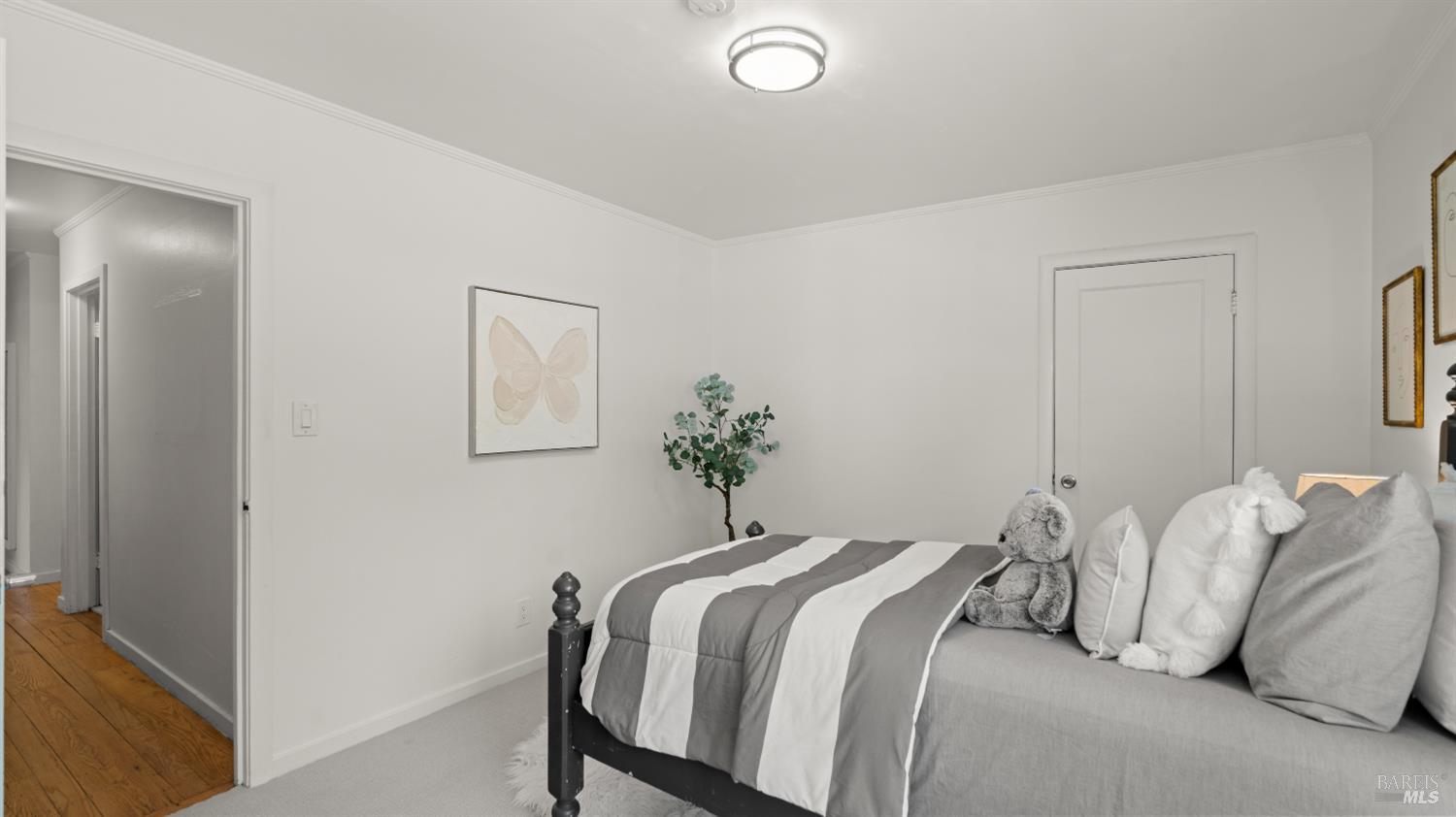 38 Bret Avenue San Rafael, CA 94901 - Photo 25 of 52 a bedroom with a bed and a lamp