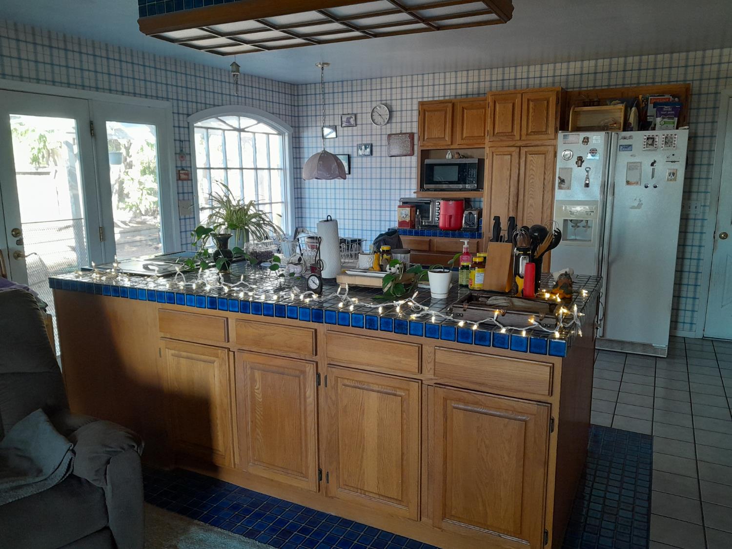 1975 Ridgecrest Way West Point, CA 95255 - Photo 12 of 71 a kitchen with stainless steel appliances granite countertop a refrigerator and wooden floor