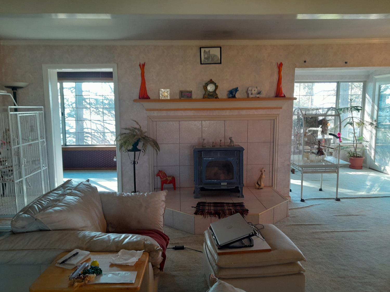 1975 Ridgecrest Way West Point, CA 95255 - Photo 17 of 71 a living room with furniture and a fireplace