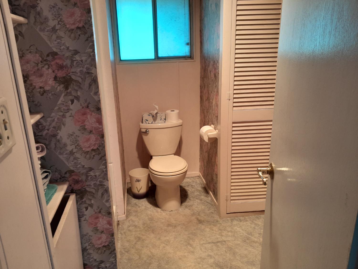 1975 Ridgecrest Way West Point, CA 95255 - Photo 19 of 71 a bathroom with a toilet and a shower curtain