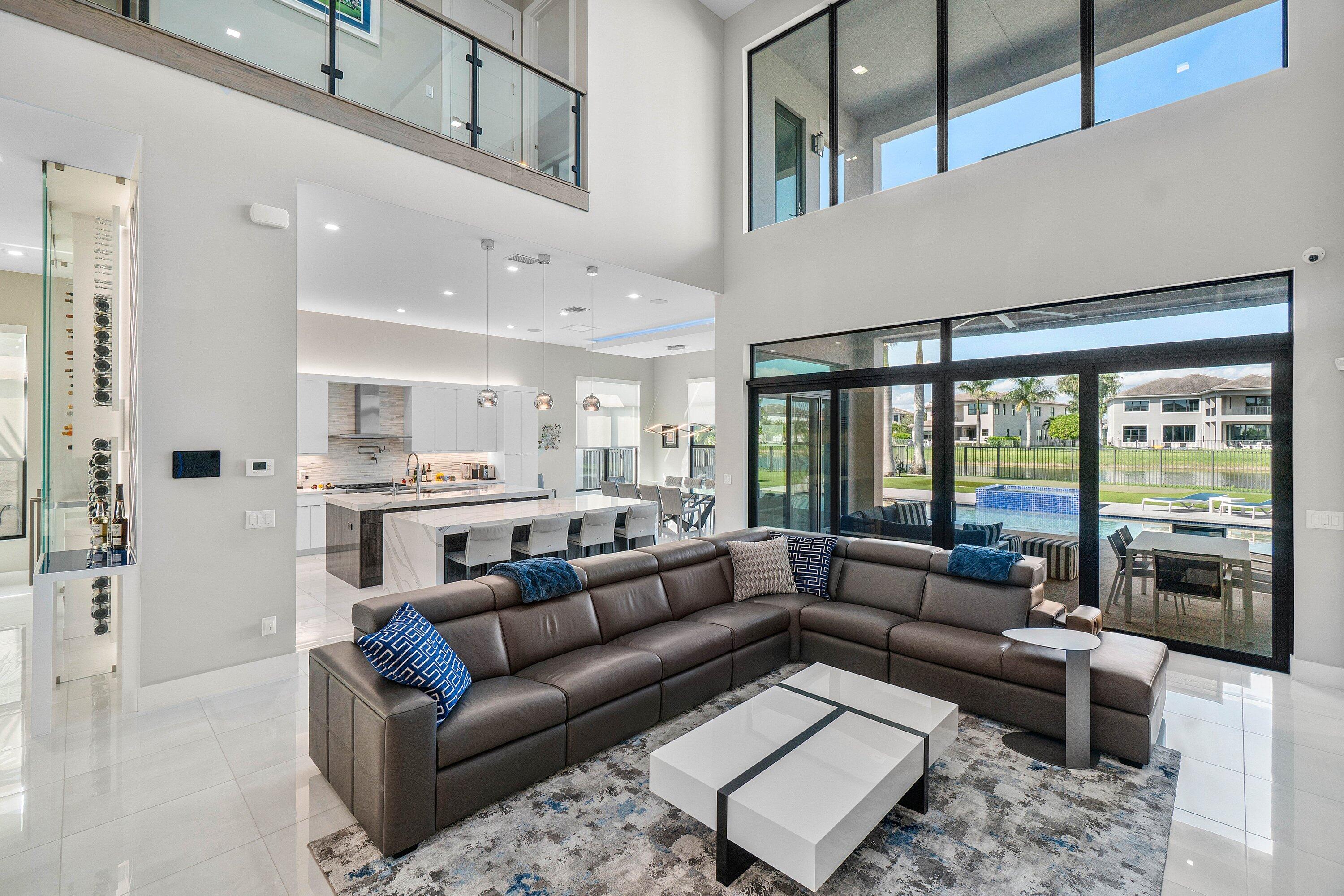 9657 Vescovato Way Boca Raton, FL 33496 - Photo 11 of 68 a living room with furniture and a large window